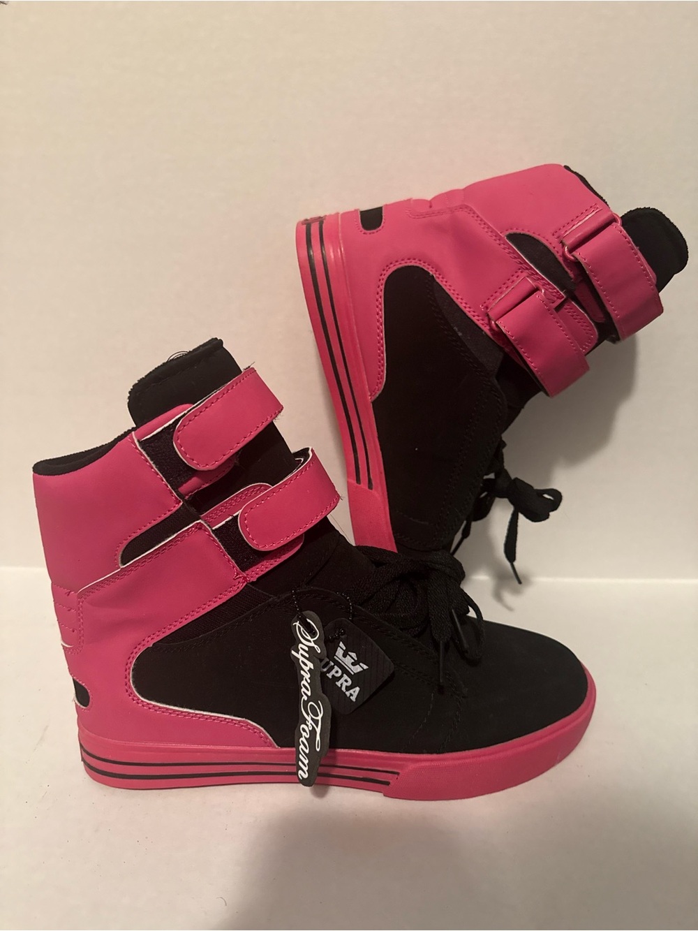 Supra Hot Pink and Black High-Top Sneakers
